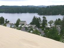 Sand dune with our campground in background